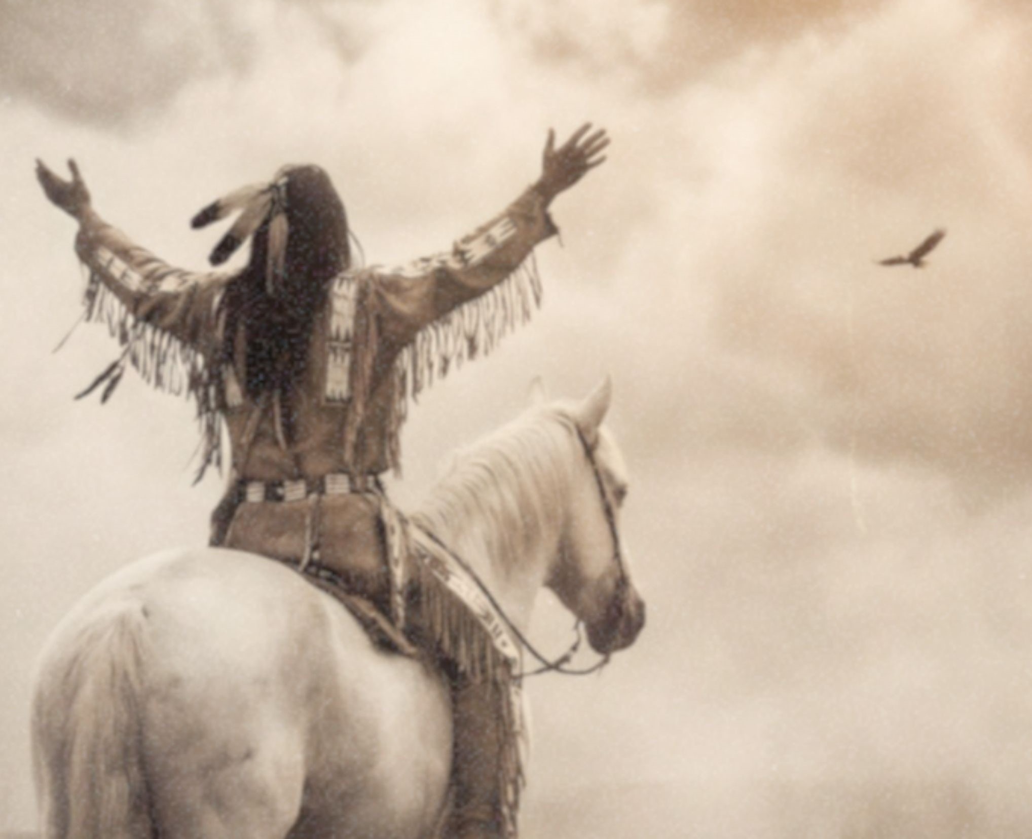 Close-up detail of a sepia-toned fine art print showing a Native American warrior from behind, seated on a white horse at the edge of a canyon cliff with both arms raised wide, facing a massive UFO glowing through turbulent storm clouds above a misty dramatic landscape, with an eagle soaring in the swirling haze beside him, revealing the rich aged texture and warm vintage tones of this surreal Western art print.