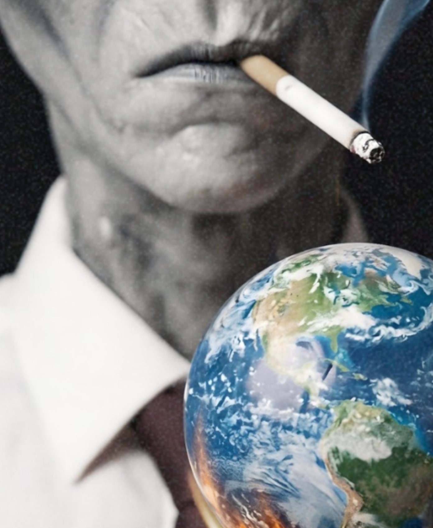 Intense close-up dark portrait of a grey alien with a cigarette between its lips using a lighter to set fire to a miniature planet Earth held in alien hands – unframed dark alien portrait poster, ufoposter.com