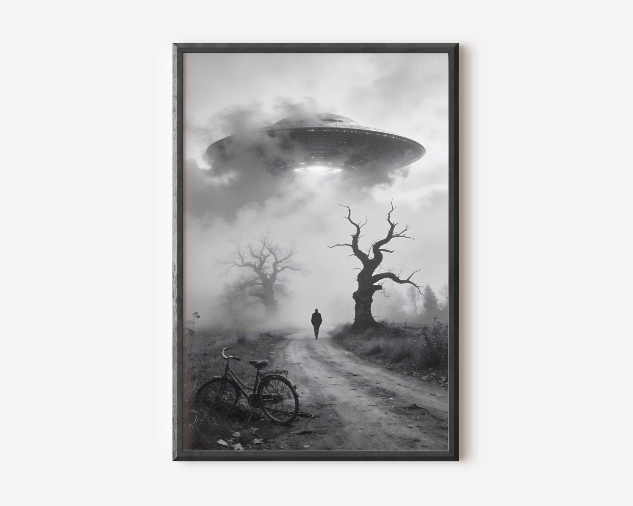 Premium dark landscape poster of a lone figure abandoning his bicycle on a foggy country road and walking toward a giant glowing UFO descending through storm clouds over a desolate winter landscape – unframed alien art poster, ufoposter.com