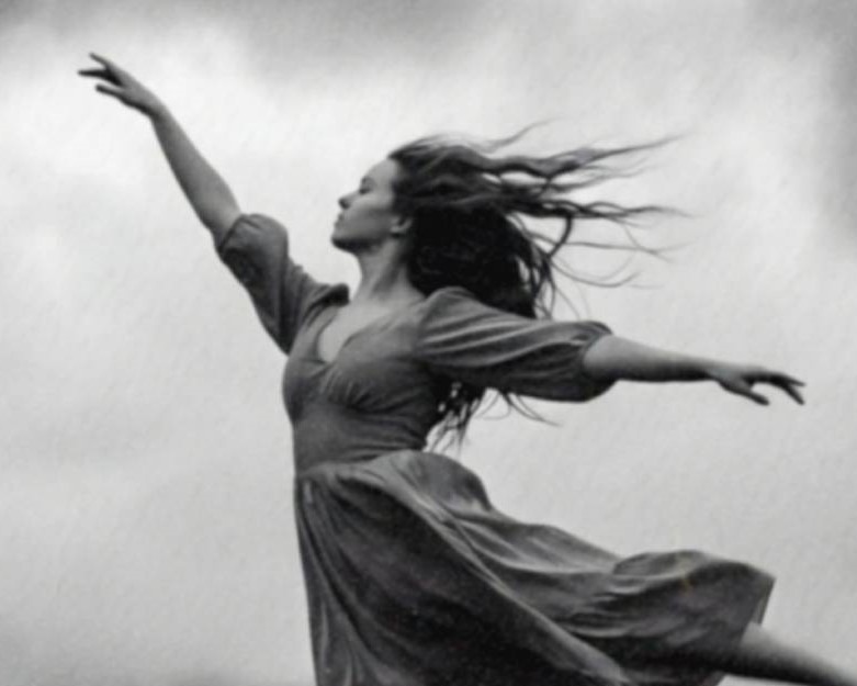 Close-up detail of a black and white art print showing a woman in a flowing dress mid-dance with arms outstretched and hair blowing in the wind, bathed in the glowing beam of a UFO descending through turbulent storm clouds above a wild landscape.
