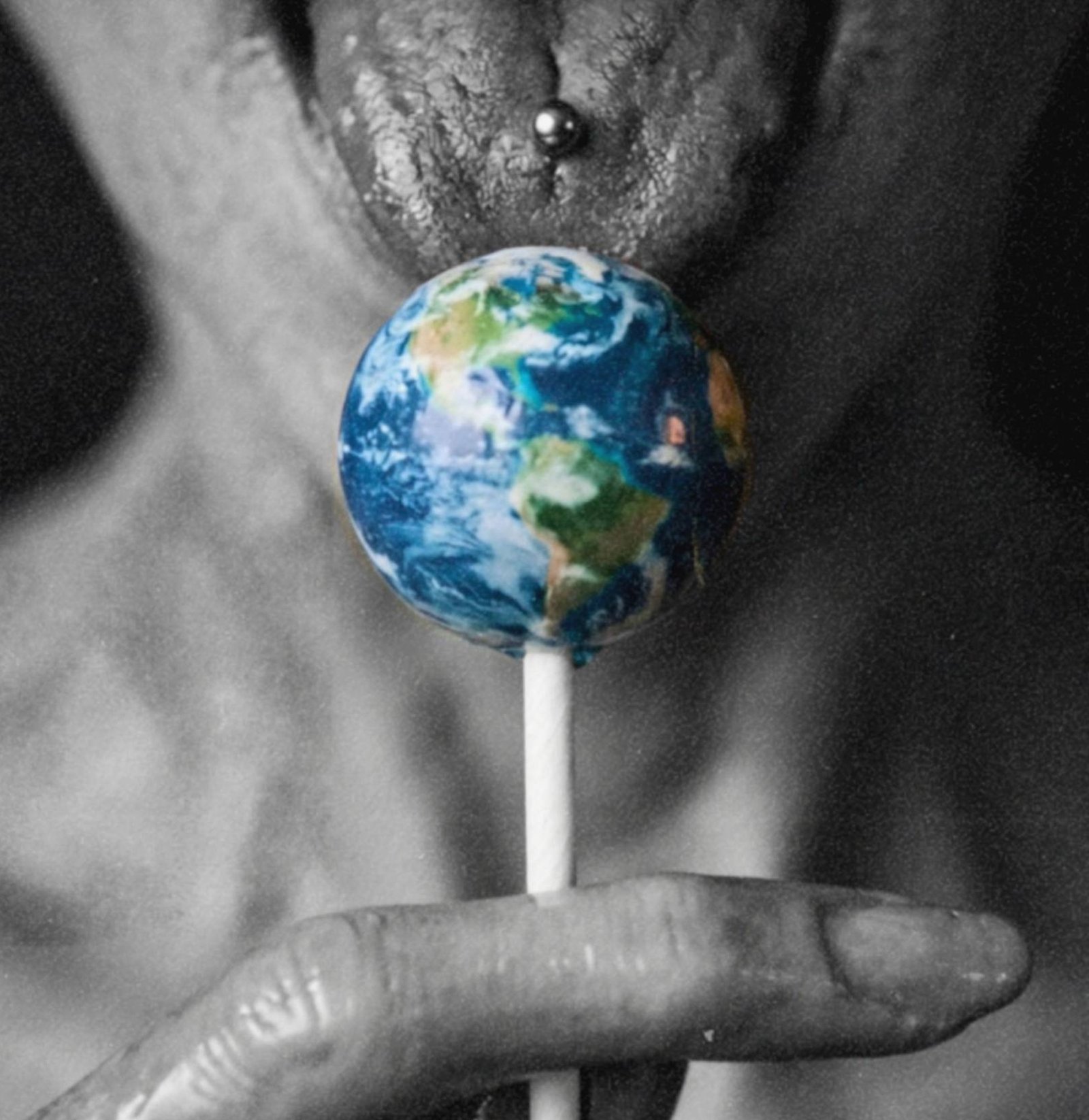 Intense macro artwork of an alien mouth and long fingers holding a planet Earth lollipop to a pierced tongue in sharp dark monochrome detail – unframed dark alien portrait poster, ufoposter.com