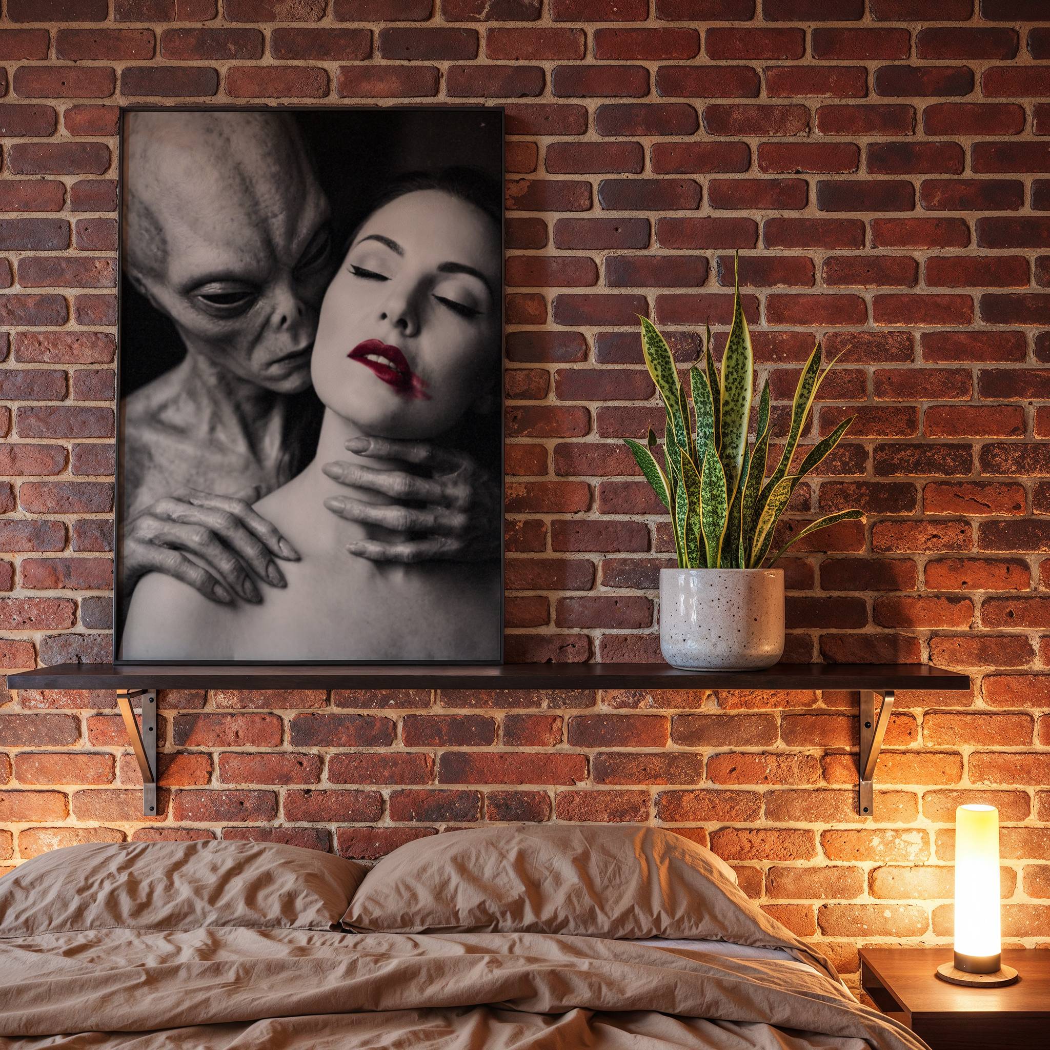 Moody black and white surreal portrait of a grey alien with long hands wrapped around a woman's neck and shoulders, her red lips contrasting against the dark monochrome scene – unframed dark art poster, ufoposter.com