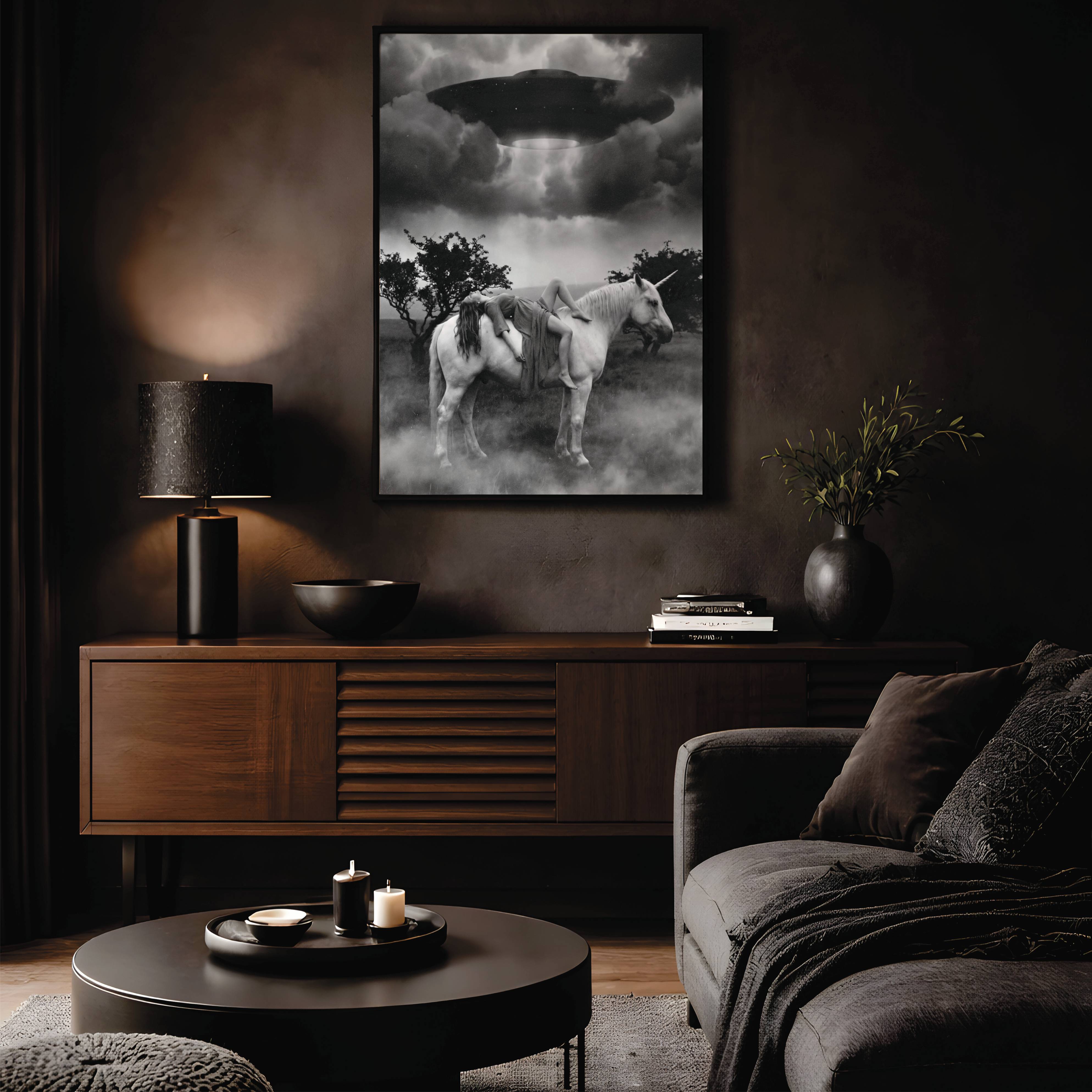 Dramatic black and white artwork of a woman draped over a unicorn in a misty field beneath a massive UFO emerging from storm clouds – unframed dark wall art poster for living room decor, ufoposter.com