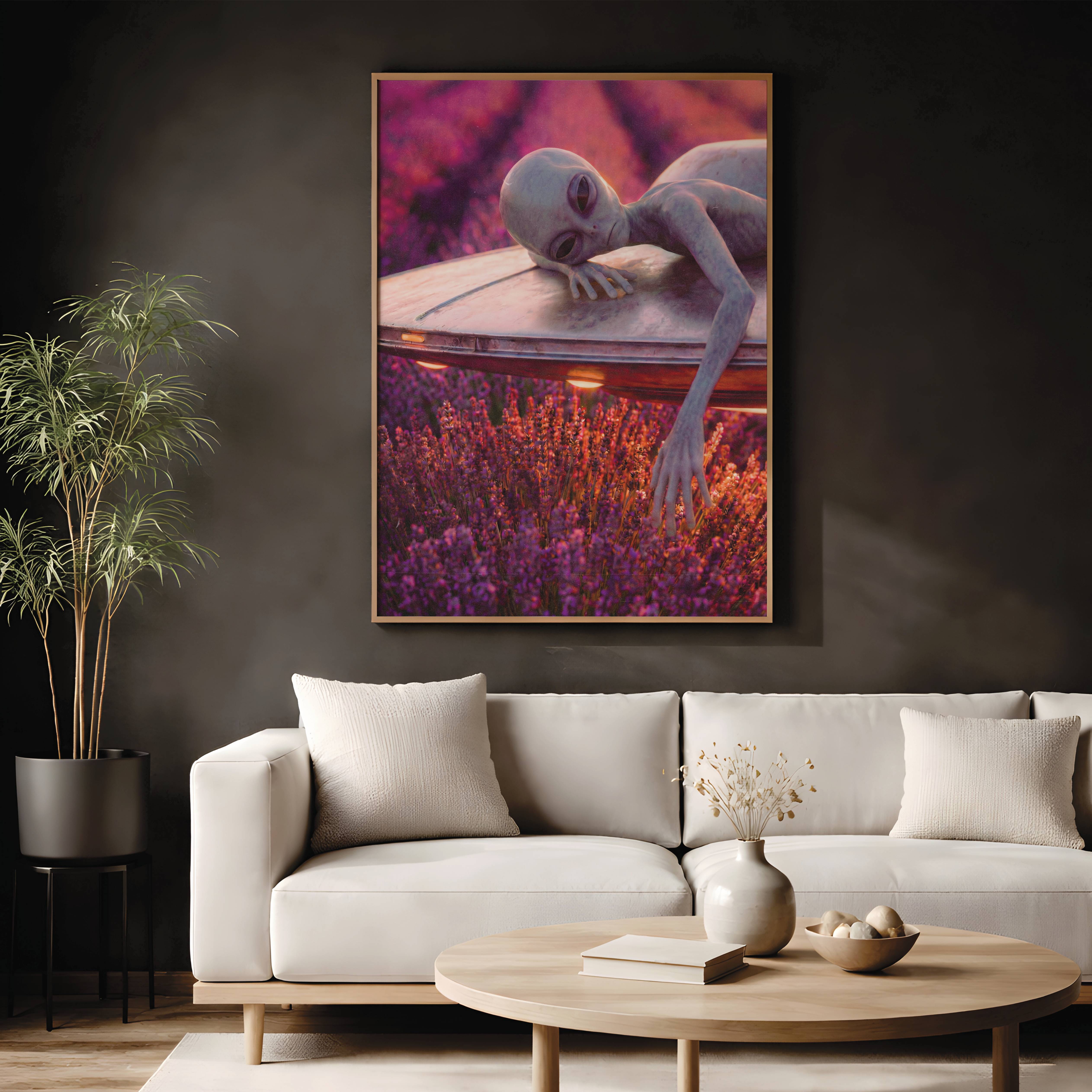 Warm purple-toned retro artwork of a grey alien lying draped across the top of a glowing UFO in a vast lavender field at golden hour, long fingers trailing over the edge of the craft in quiet contentment – unframed retro alien wall poster, ufoposter.com