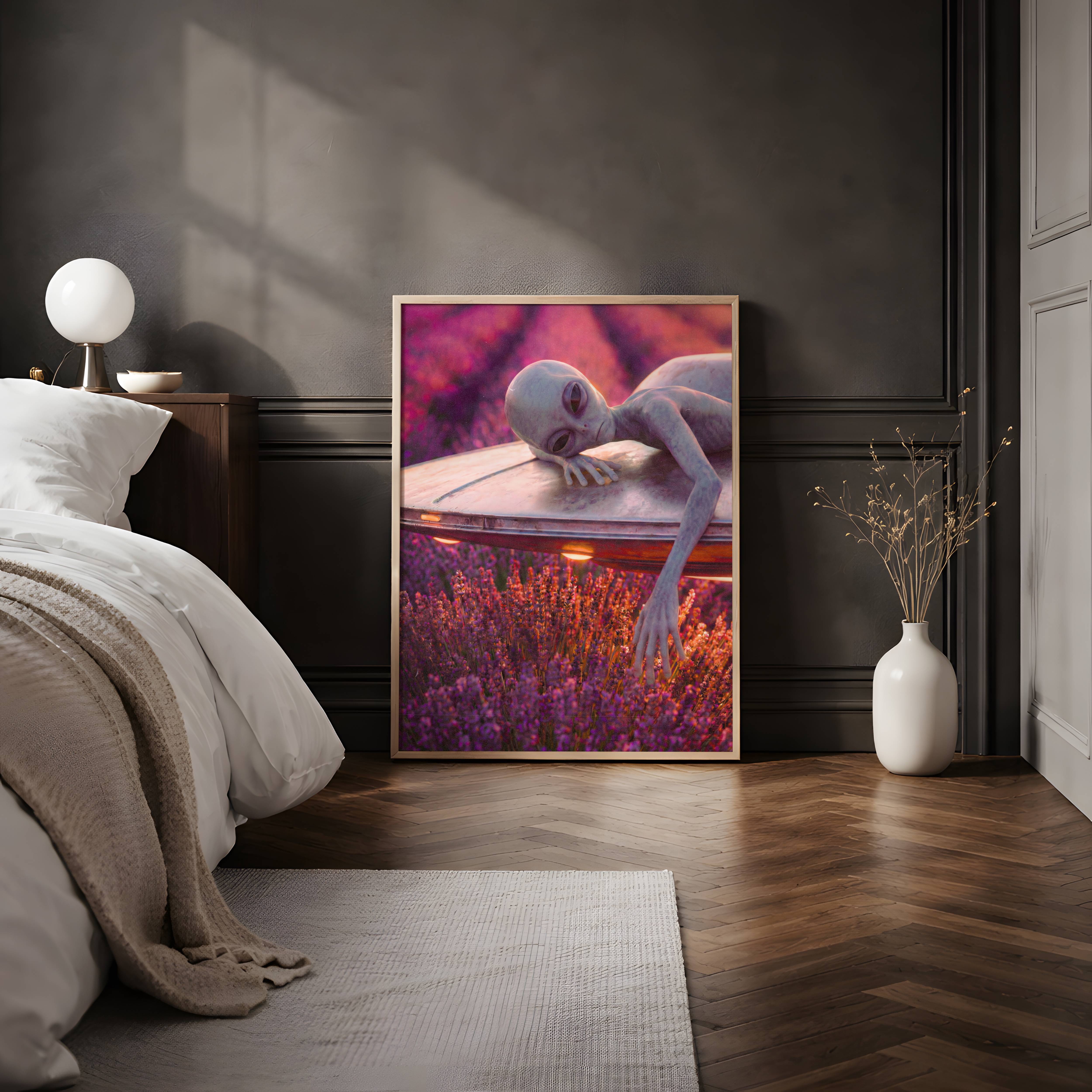 Warm dreamy retro artwork of a grey alien resting on top of a glowing UFO above a vast purple lavender field — a beautifully atmospheric and gently surreal sci-fi art print perfect for bedroom decor – unframed retro alien bedroom poster, ufoposter.com