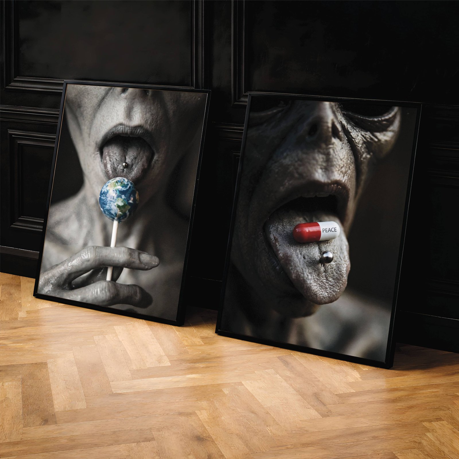 Dark close-up poster duo featuring a grey alien licking a planet Earth lollipop with a pierced tongue, paired with a horned alien creature balancing a PEACE capsule on its tongue – two darkly satirical sci-fi artworks questioning alien appetites and control – unframed dark alien poster set, ufoposter.com