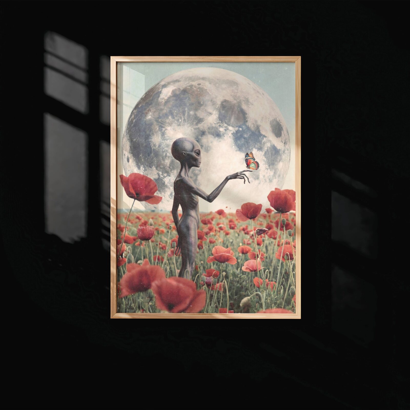 Bold and beautifully romantic dreamy retro artwork of a grey alien holding a butterfly in a glowing red poppy field beneath an enormous luminous moon — a truly distinctive and visually stunning alien wall art print – unframed retro alien statement poster, ufoposter.com