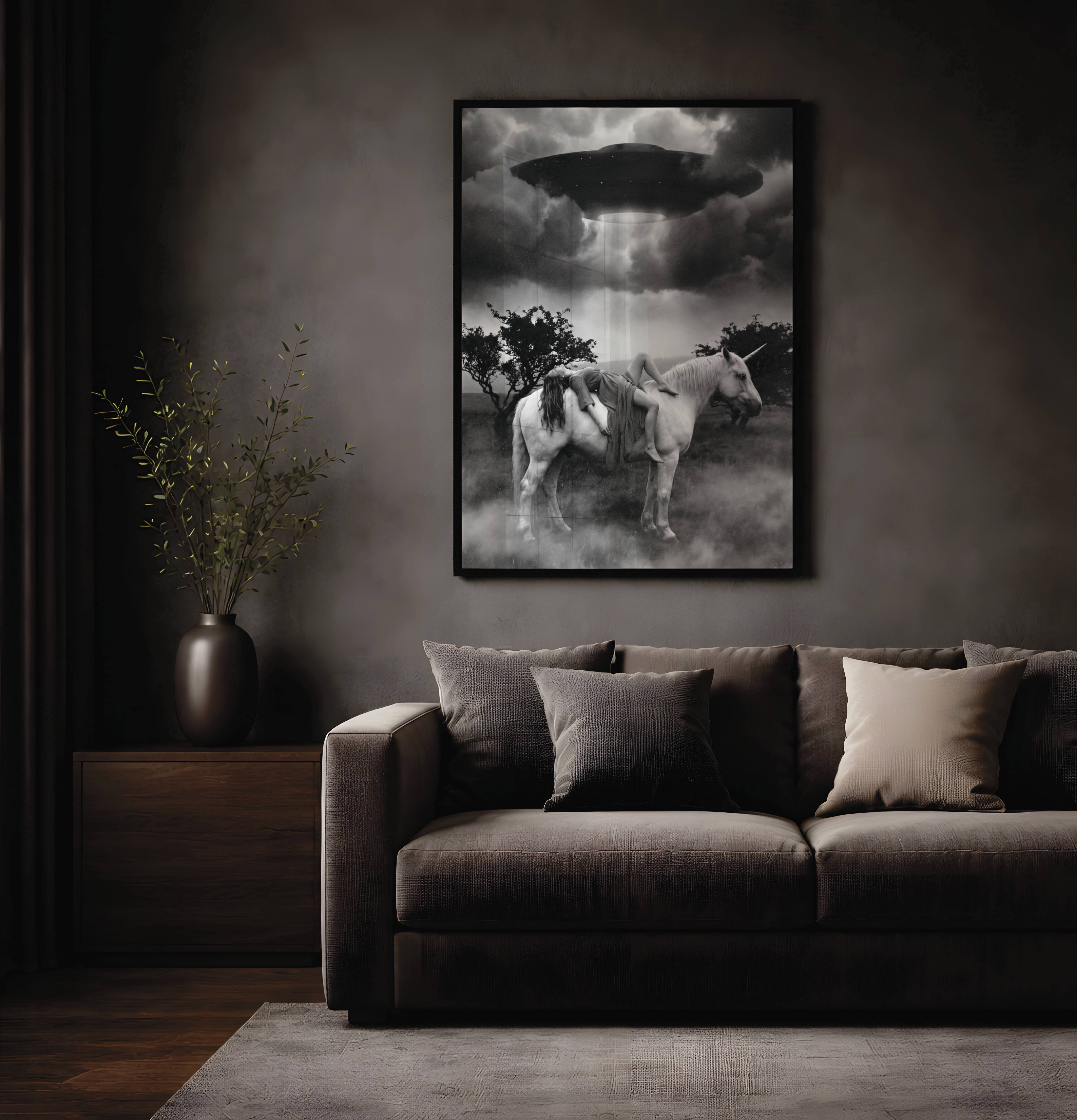 Dark cinematic black and white artwork of a woman on a unicorn in a misty field under a hovering UFO surrounded by dramatic storm clouds – unframed alien wall poster, ufoposter.com