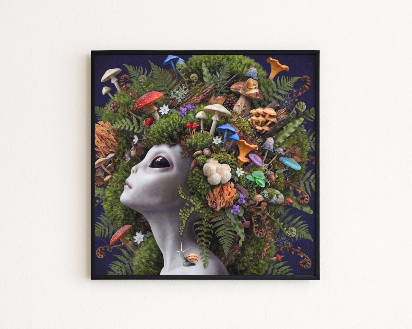 Premium bold surreal portrait of a grey alien with calm dark eyes crowned with an extraordinary abundance of wild mushrooms — fly agarics, chanterelles, lion's mane, porcini, blue trumpets, honey mushrooms and coral fungi — nestled amongst deep green moss, curling ferns, pine cones and woodland flowers against deep dark navy with a snail on her collarbone — a genuinely unique and luscious alien mushroom wall art print – unframed rich alien mushroom art poster, ufoposter.com