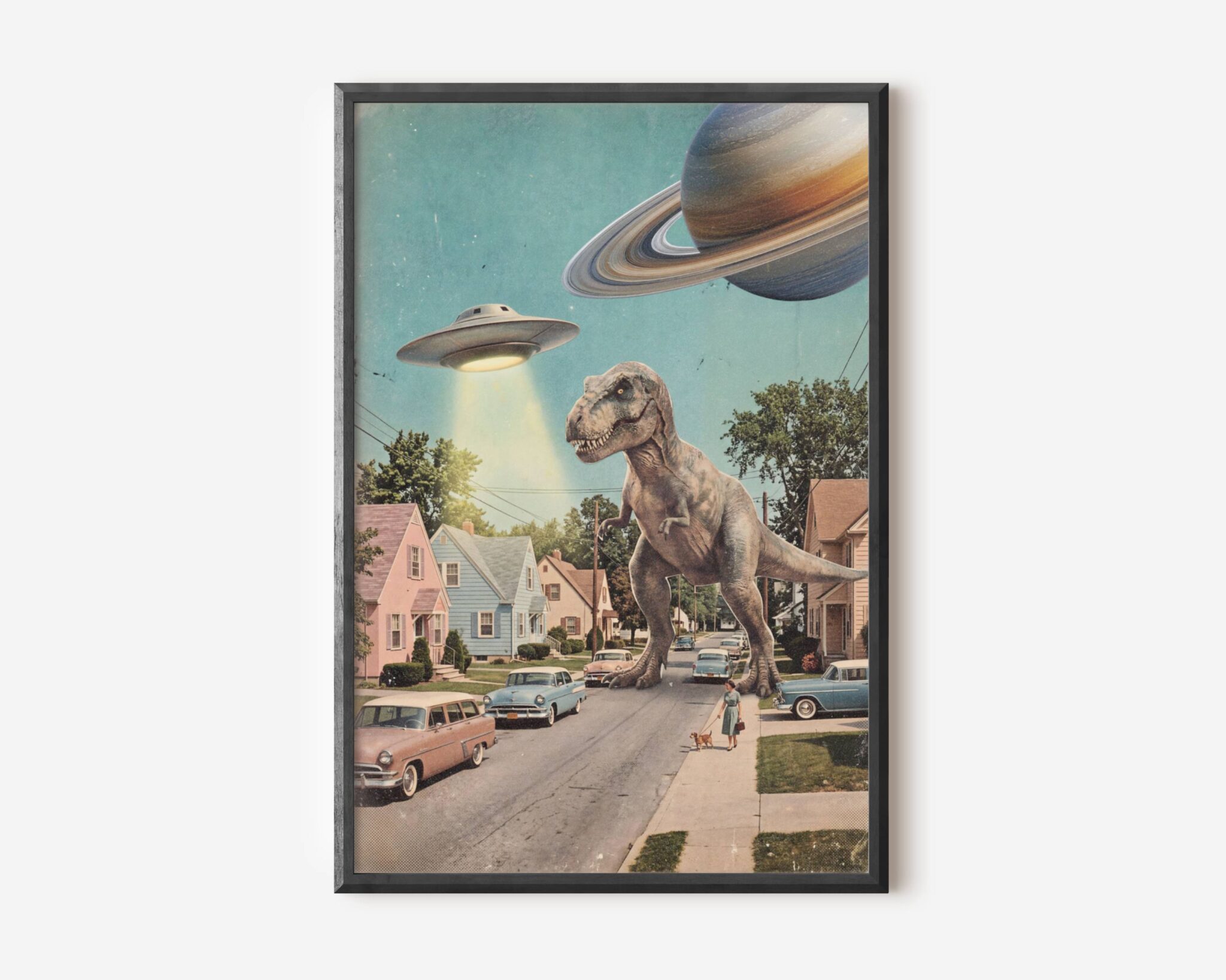 Premium funny retro collage poster of a colossal T-Rex striding down a 1950s American suburban street past pastel houses and vintage cars, a UFO blazing overhead and Saturn in the corner of the sky — bold, bright and brilliantly funny retro sci-fi collage wall art – unframed funny retro collage poster, ufoposter.com