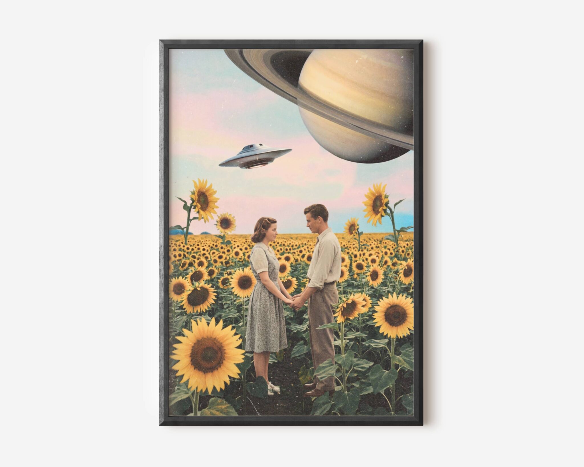Premium warm retro collage poster of a 1950s couple hand in hand in a vast golden sunflower field beneath a pastel pink sky with Saturn filling the corner and a UFO drifting past — romantic, warm and beautifully surreal retro collage wall art – unframed funny retro collage poster, ufoposter.com