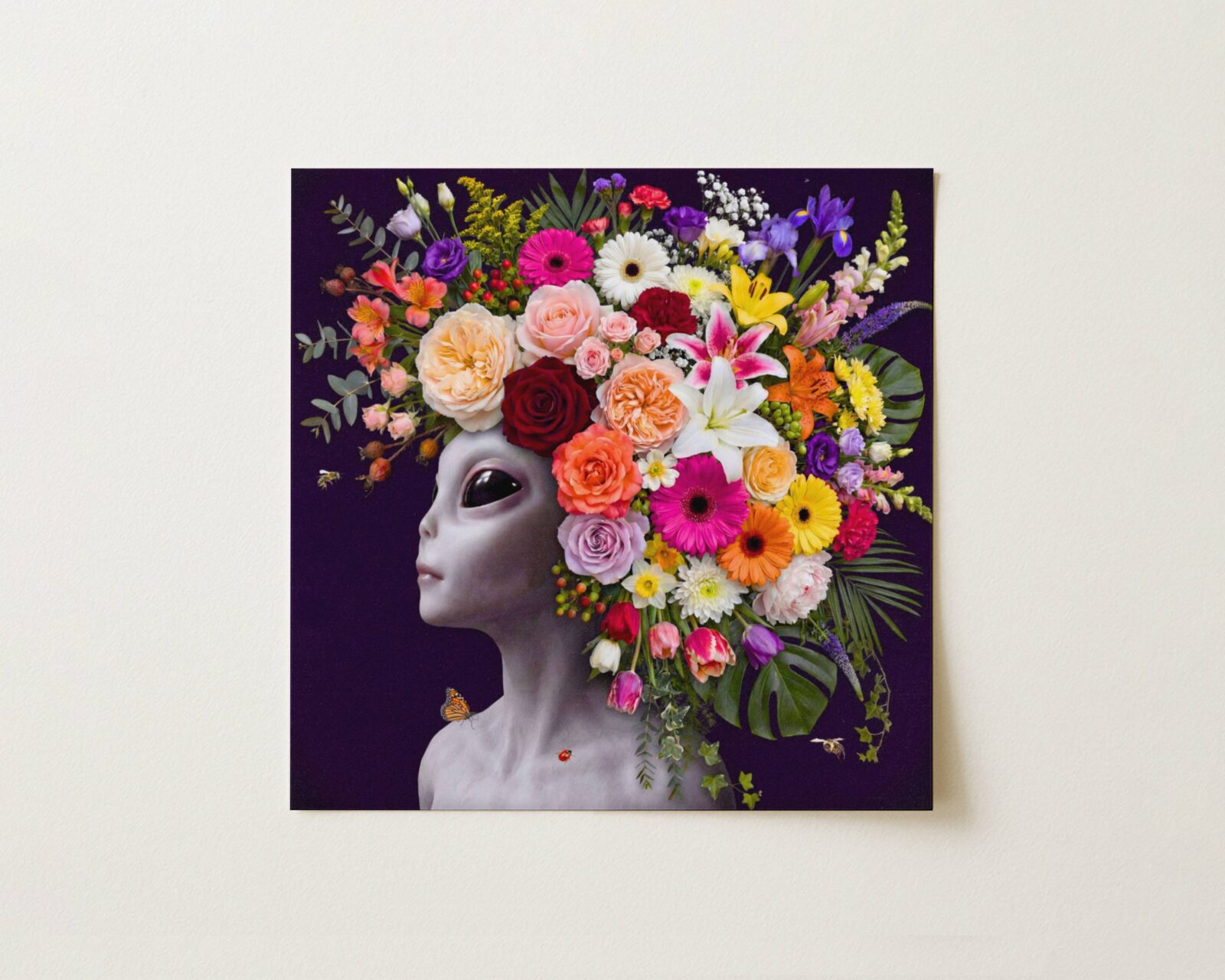 Flat print bold rich surreal portrait of a grey alien crowned with an extraordinary abundance of flowers — roses, gerberas, lilies, irises and tulips — cascading against a deep dark purple background with a monarch butterfly — high quality unframed flat poster print, ufoposter.com