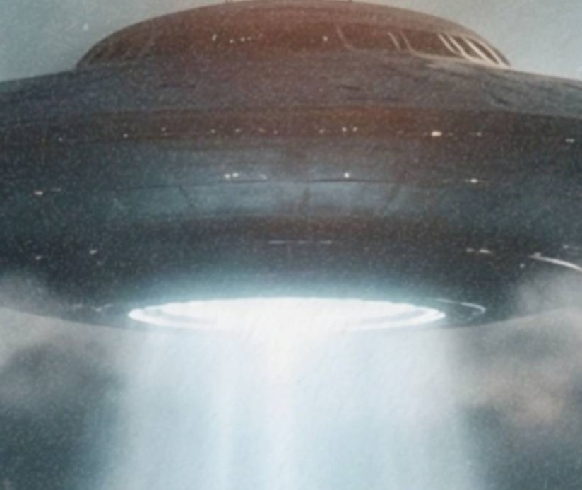 Intense dark retro close-up of a massive UFO's blinding white beam pouring through heavy storm clouds directly onto the ancient standing stones of Stonehenge, mist swirling around the stones and a lone figure caught in the light at the centre – unframed retro UFO Stonehenge detail poster, ufoposter.com