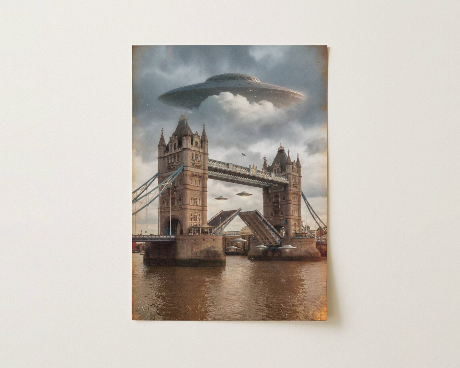 Flat print dramatic warm golden retro artwork of a massive UFO above Tower Bridge in stormy skies, two more spacecraft positioned through and on the iconic London river crossing over the glowing Thames — high quality unframed flat poster print, ufoposter.com