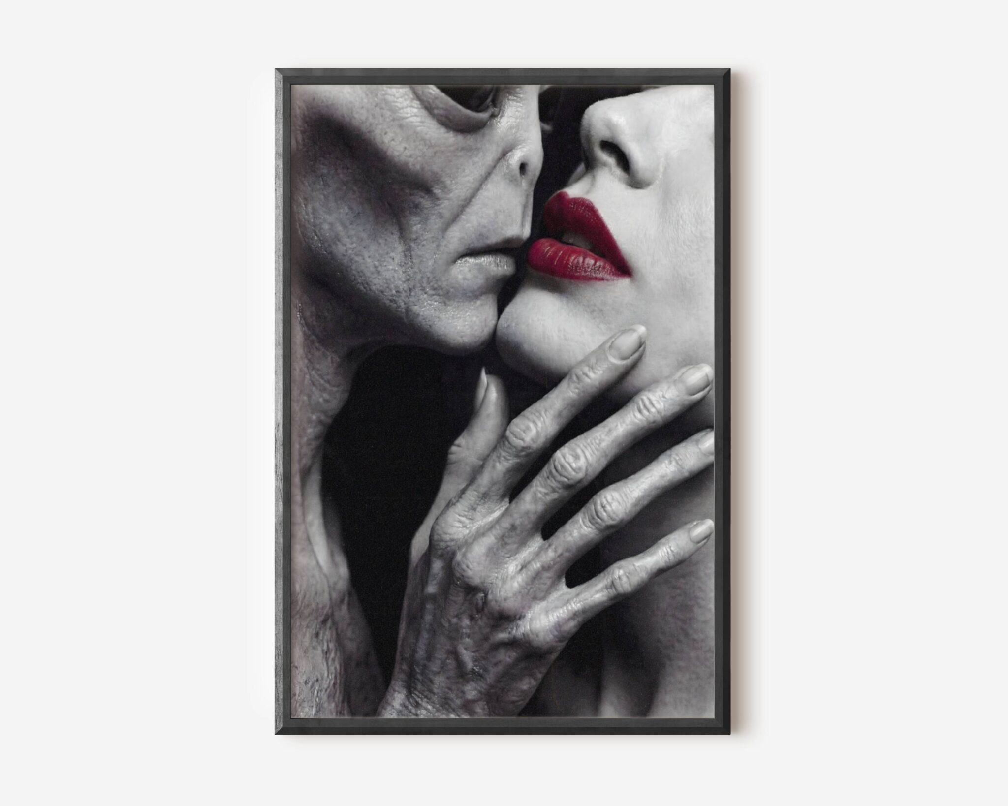 Premium dark monochrome extreme close-up of a grey alien leaning toward a woman's vivid red lips, long textured alien fingers wrapped around her throat in a stark and cinematic black and white composition — bold and provocative dark alien wall art – unframed dark alien art poster, ufoposter.com