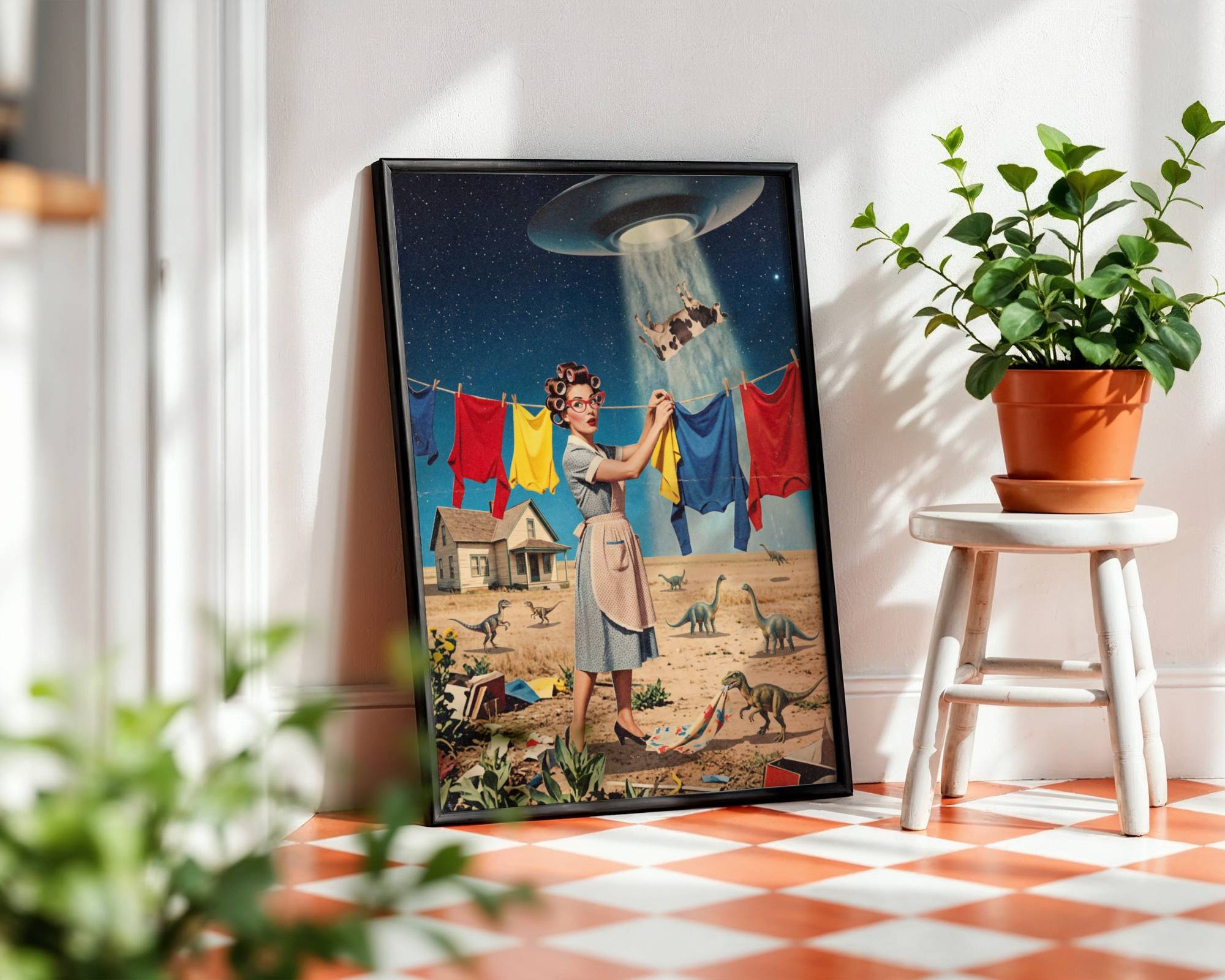 Bold colourful vintage retro collage of a 1950s housewife in hair rollers and apron hanging colourful laundry as a UFO beams a cow skyward above a dinosaur-roamed prairie landscape – unframed funny retro alien wall poster, ufoposter.com
