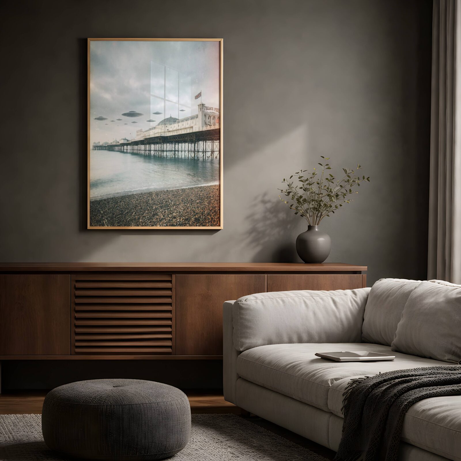 Soft atmospheric retro artwork of a fleet of UFOs hovering in perfect formation above Brighton Palace Pier in a pale grey winter sky, the Union Jack flying from the tower and the shingle beach stretching in the foreground — a distinctive and beautiful Brighton wall art print for living room decor – unframed retro UFO poster for living room, ufoposter.com