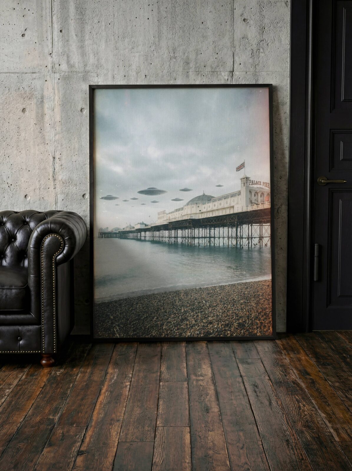 Beautifully hazy retro artwork of a UFO fleet in pale grey skies above Brighton Palace Pier, Union Jack flying from the tower as the calm sea and shingle beach stretch below — a softly cinematic and distinctive Brighton poster perfect for living room decor – unframed retro sci-fi living room poster, ufoposter.com