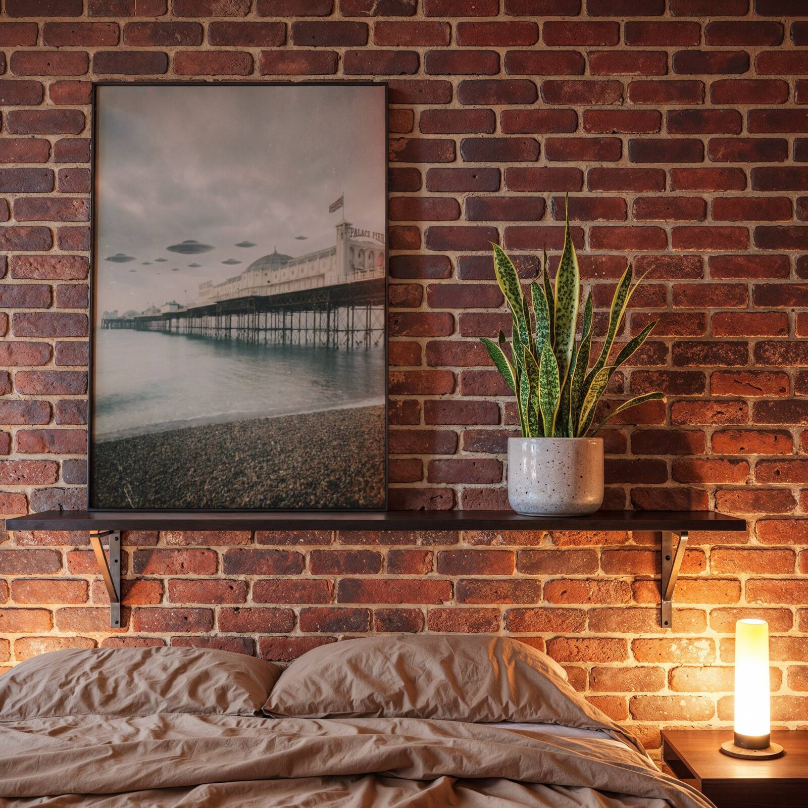 Beautifully hazy retro artwork of a UFO fleet in pale grey skies above Brighton Palace Pier, the pier stretching into winter mist and shingle beach below — a softly cinematic Brighton poster perfect for creating a calm and distinctive atmosphere in bedroom decor – unframed retro sci-fi bedroom poster, ufoposter.com